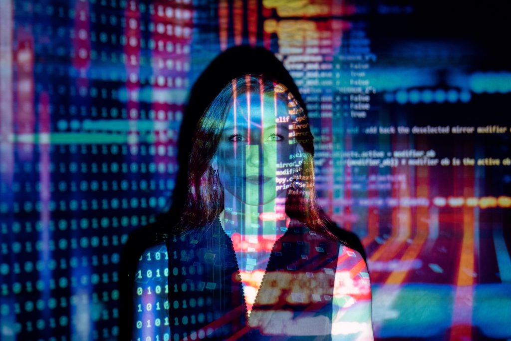 code projected over woman to show data migration