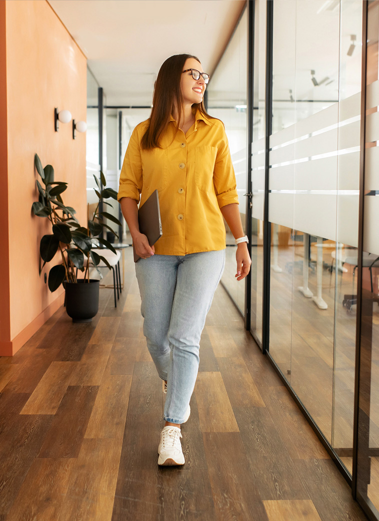 Female staffer walking hallway