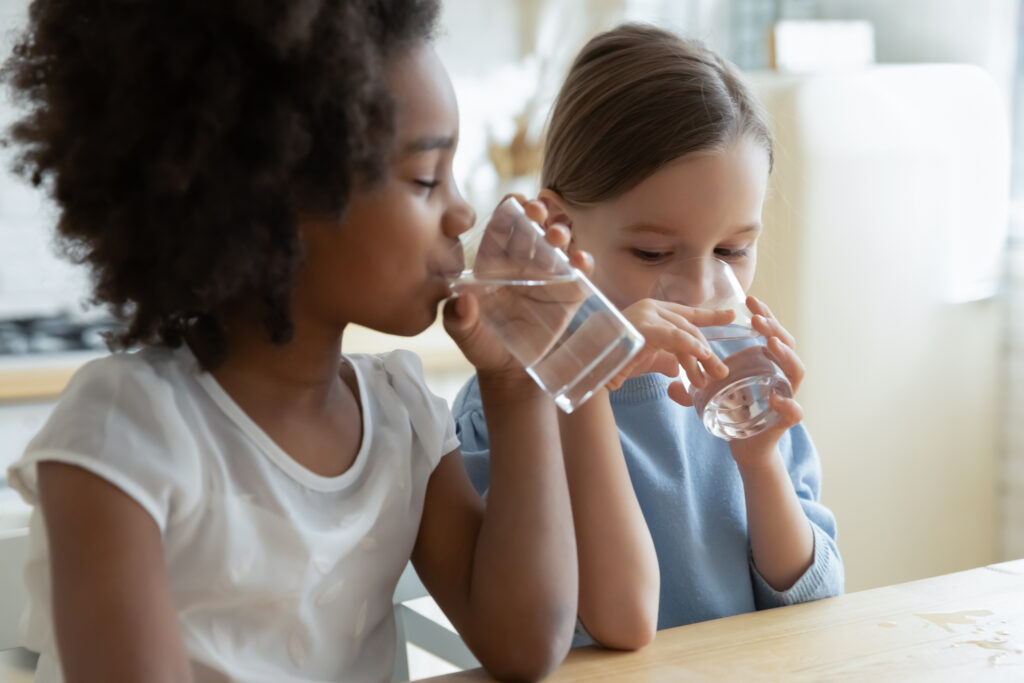 kids drinking clean water at home