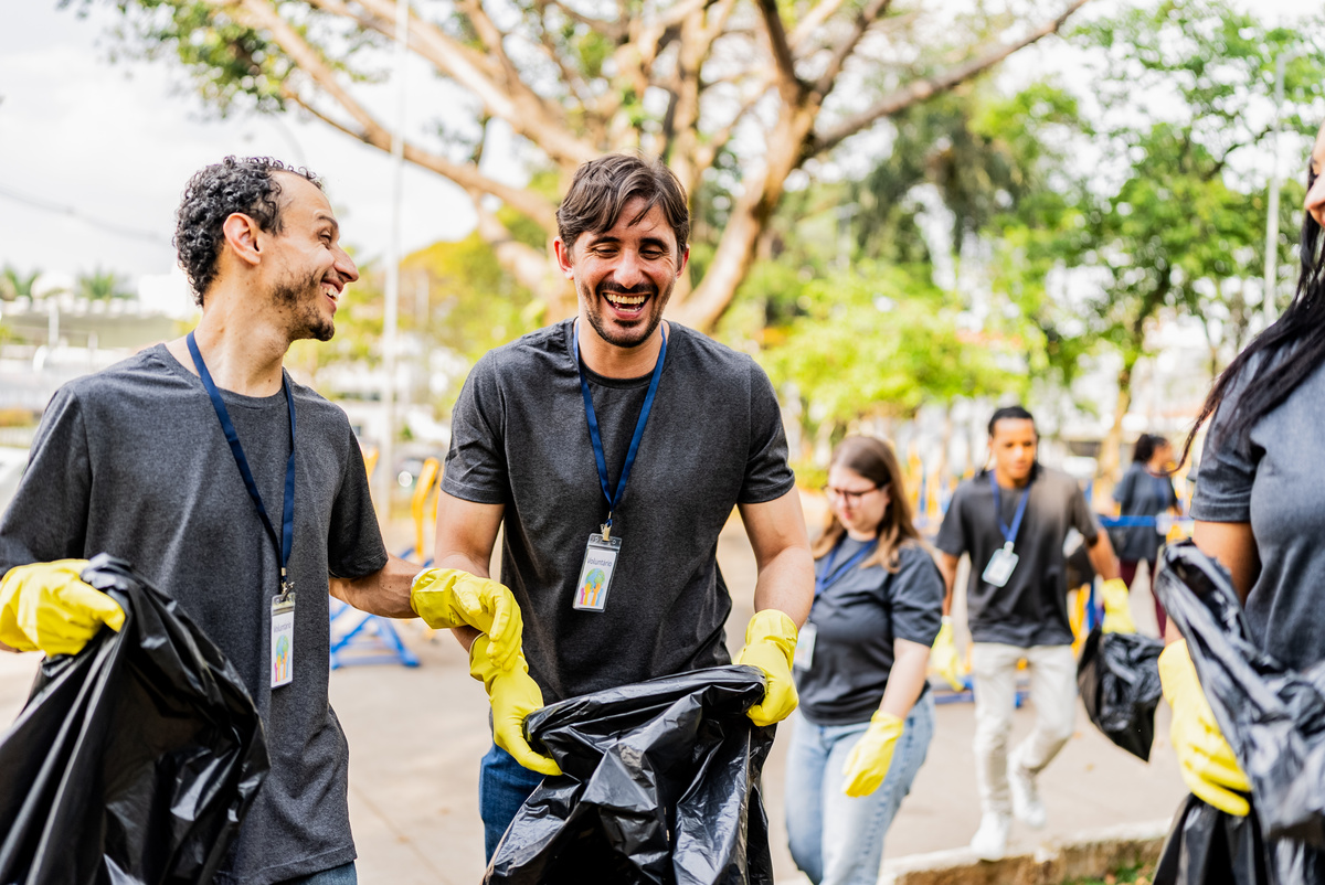 Humanitarian Volunteers recycling outdoors
